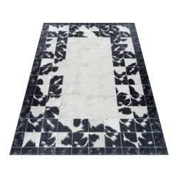 Machine washable non-slip mat with grey and white checkered pattern