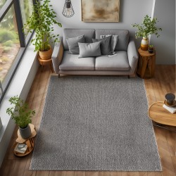 Alfombra moderna de bucle en gris oscuro, aspecto tejido natural, adecuada para sala de estar, dormitorio u oficina.