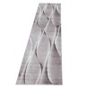 Modern beige rug with soft, wavy organic patterns and a 3D effect, ideal for the living room, bedroom, and dining room.