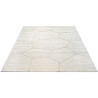 Tappeto moderno color crema con effetto pietra testurizzata e forme irregolari