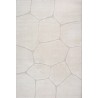 Tappeto moderno color crema con effetto pietra testurizzata e forme irregolari
