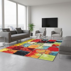Tappeto moderno multicolore con motivo patchwork astratto e pelo di 13 mm.