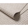 Flat woven indoor/outdoor rug with a durable textured pattern. Rug for living room, patio, or balcony.