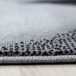 Modern designer living room rug with short pile wave pattern, black and grey