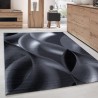 Modern designer living room rug with short pile wave pattern, black and grey