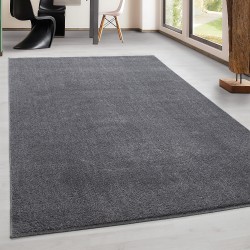 Modern short pile living room rug, single color speckled light grey