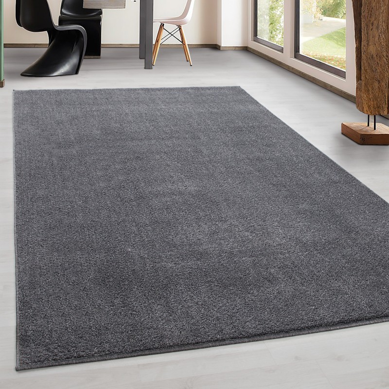 Modern short pile living room rug, single color speckled light grey