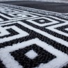 Alfombra de diseño geométrico moderno con borde óptico Versace, en blanco y negro