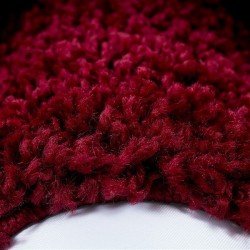 Tappeto shaggy a pelo lungo, bordo di design, colori e misure disponibili.