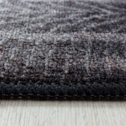 Children's rug with short pile and car race track design, red